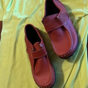 Orange rust color shoes brand new. You are going to love them.
